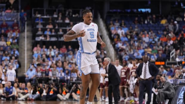 North Carolina Tar Heels forward Armando Bacot hops off after being injured.